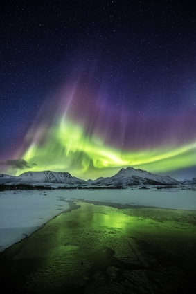 Northern Lights Over Mountains